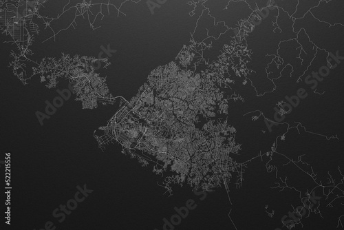 Street map of Douala (Cameroon) on black paper with light coming from top