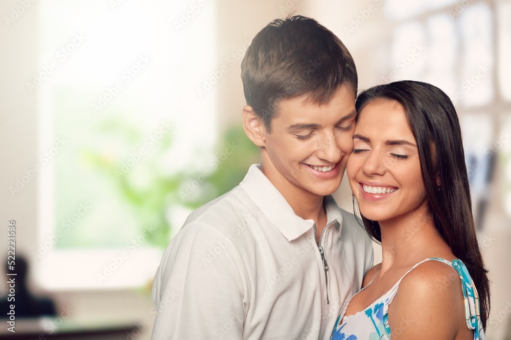 Happy young couple posing together Happy young couple posing together