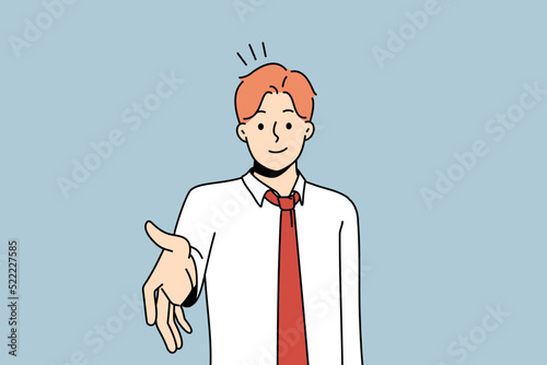Smiling young businessman stretch hand for handshake with business client or partner. Male employee handshake customer. Greeting or acquaintance. Vector illustration.  photo