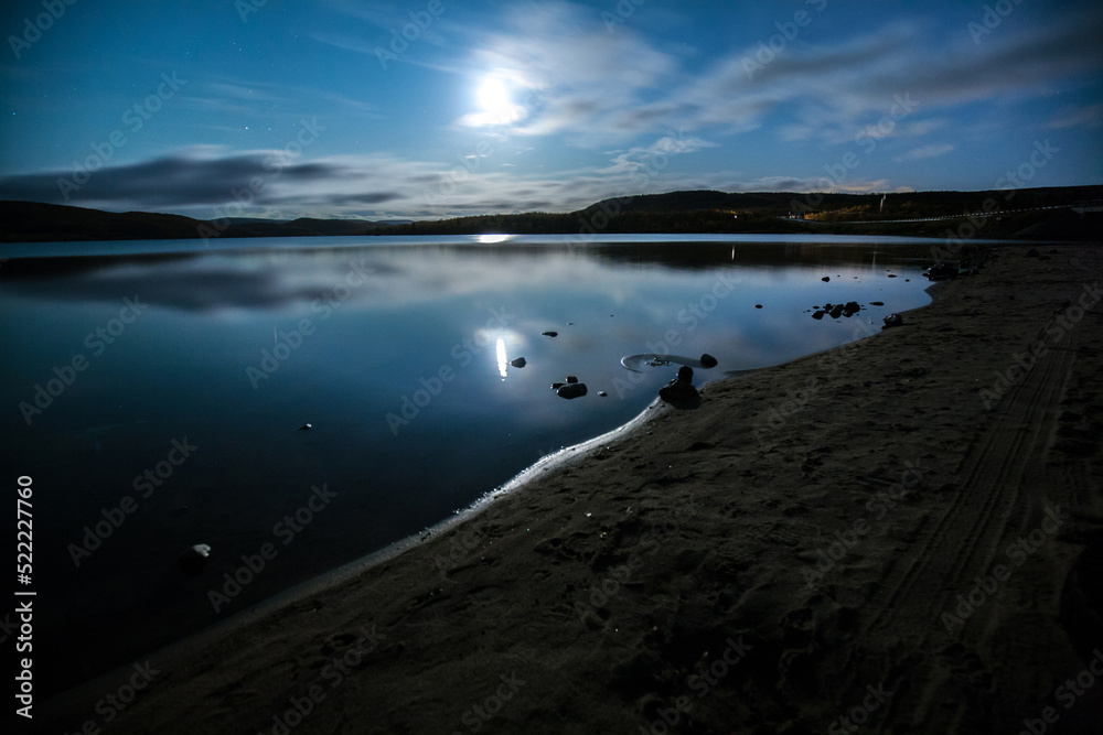 Moonlight over the lake in Murmansk, Russia