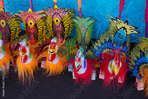 Indonesian children's traditional toy, shaped like an animal with wheels, the toy will make a sound when it is run.