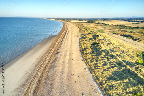 Aerial photo over the sand dunes that protect the Littlehampton links golf course from the sea.