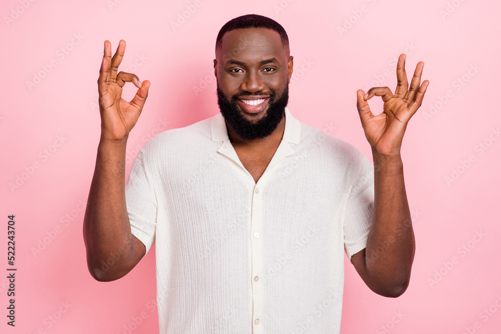 Naklejka premium Photo of friendly cheerful person two hands fingers demonstrate okey isolated on pink color background