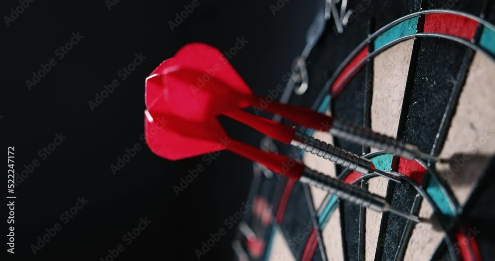 throwing dart arrows in the dartboard. target marketing concept