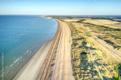 Aerial photo over the sand dunes that protect the Littlehampton golf course from the sea during the dry and hot summer of 2022.