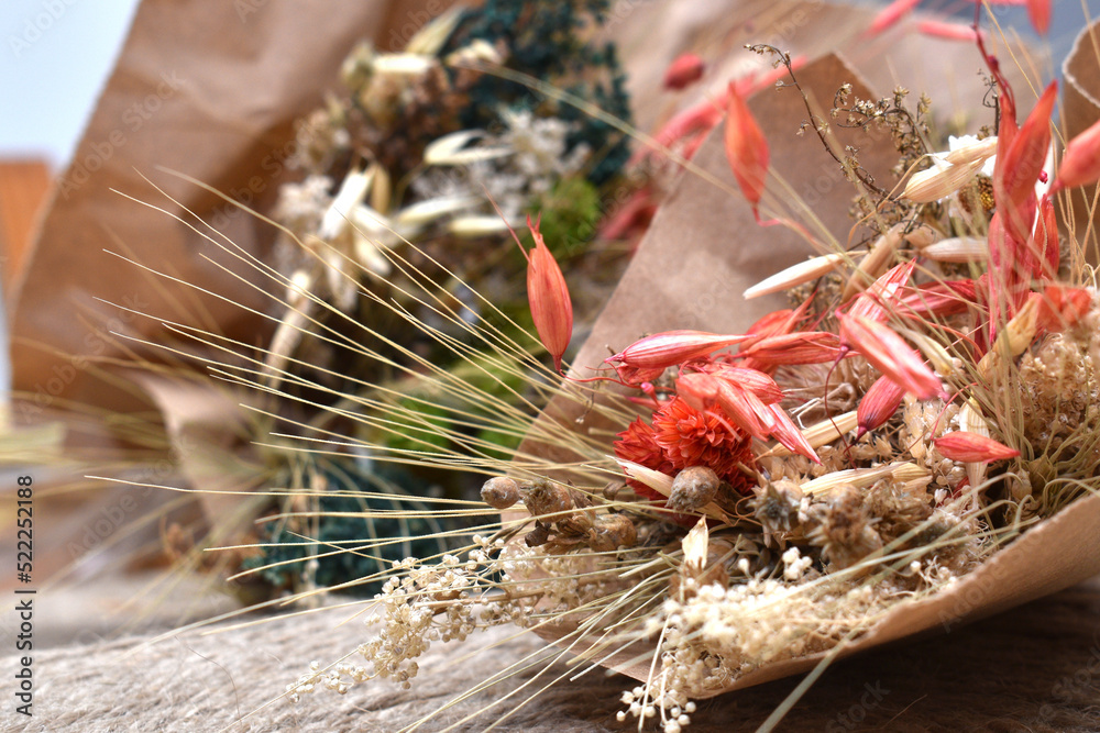 Naklejka premium a bouquet of dried flowers of different species