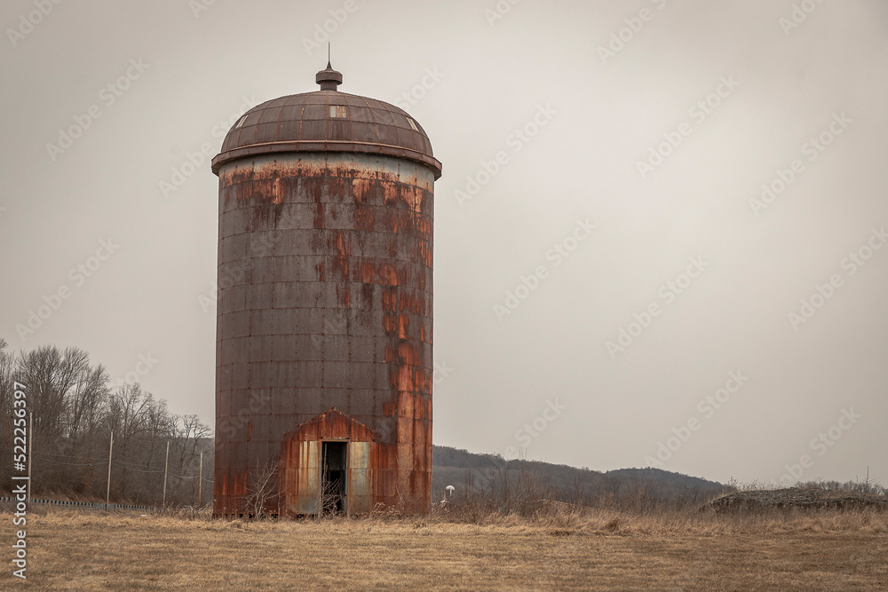 A Lone Arabic Style Silo in a Field