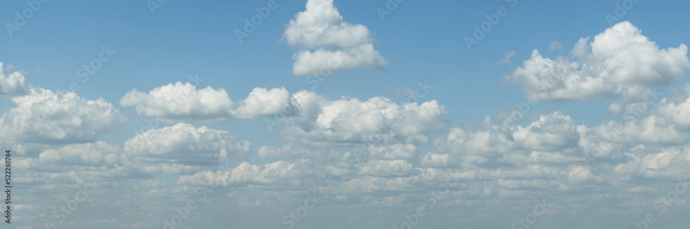 Russia. South of Western Siberia. Panorama of the daytime summer sky with cumulus clouds over the fields of Kuznetsk Alatau. Russia. South of Western Siberia. Panorama of the daytime summer sky with cumulus clouds over the fields of Kuznetsk Alatau.