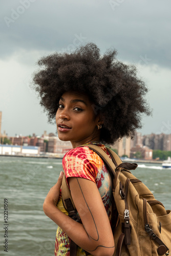 Photography USA, New York City, Portrait of young woman with backpack