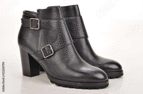 Pair of black leather boots.