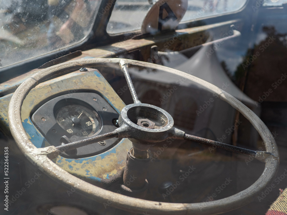 Fototapeta premium Dashboard and steering wheel of old-timer car