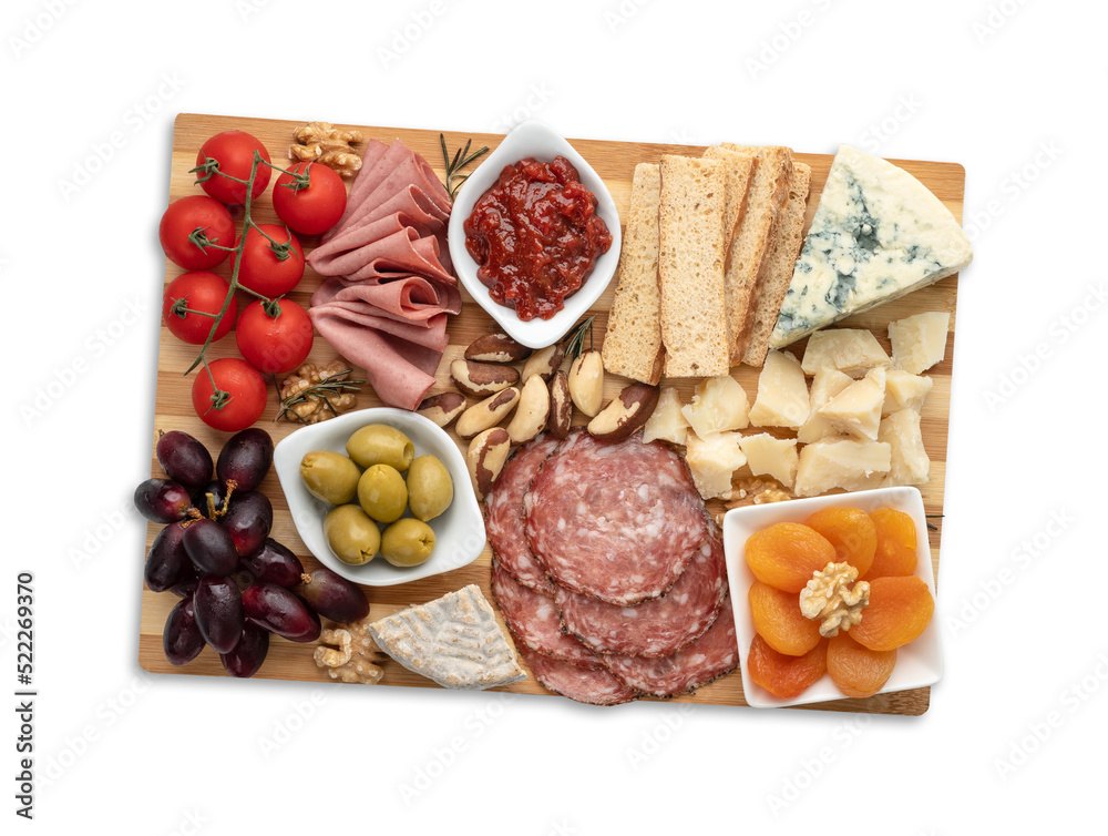Appetizer board with cheese, nuts, fruits, toasts and charcuterie isolated over white background