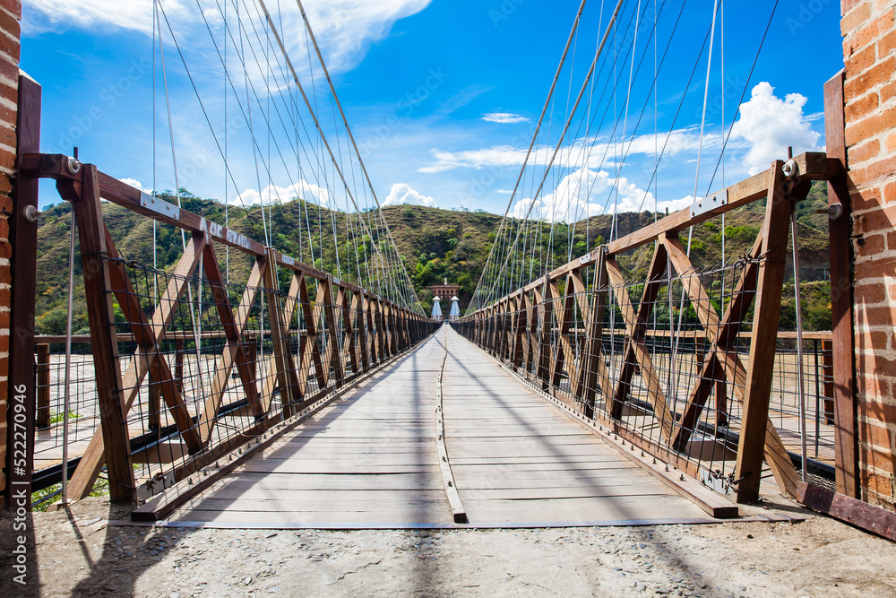 The historical Bridge of the West a a suspension bridge declared Colombian National Monument built in 1887 over the Cauca River