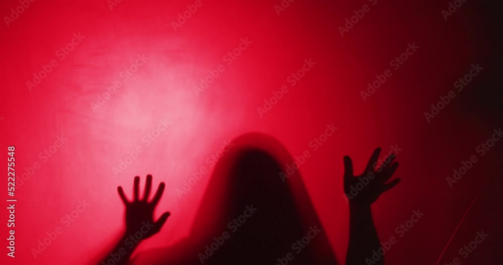 Video of silhouette of man moving on red background Video of silhouette of man moving on red background