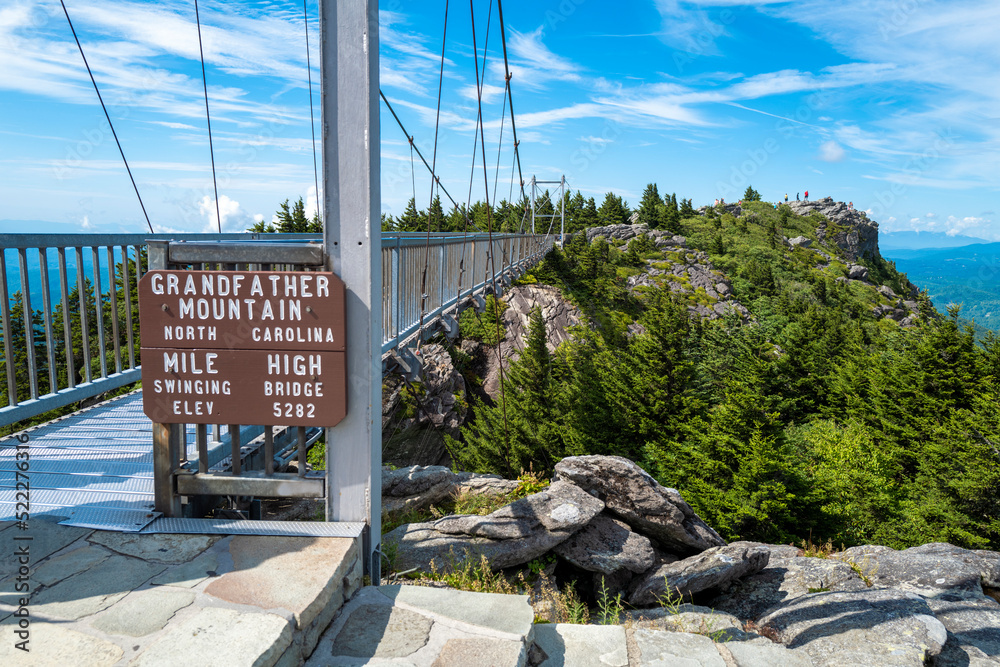 Swinging suspension bridge at Grandfather Mountain State Park, North Carolina, USA. Focus on far