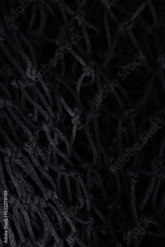 Black net on black background. Suitable for posters, covers, banners, and other marketing purposes. 