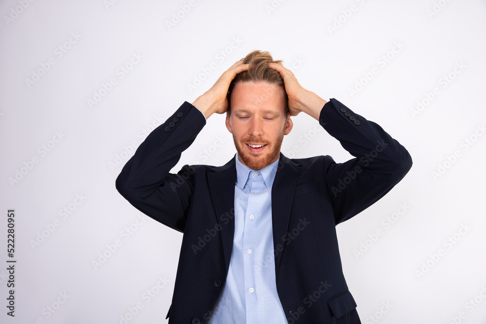 Portrait of smiling businessman forgetting something. Young Caucasian manager wearing blue shirt and black suit coat clutching his head or touching hair. Problem and trouble concept Portrait of smiling businessman forgetting something. Young Caucasian manager wearing blue shirt and black suit coat clutching his head or touching hair. Problem and trouble concept