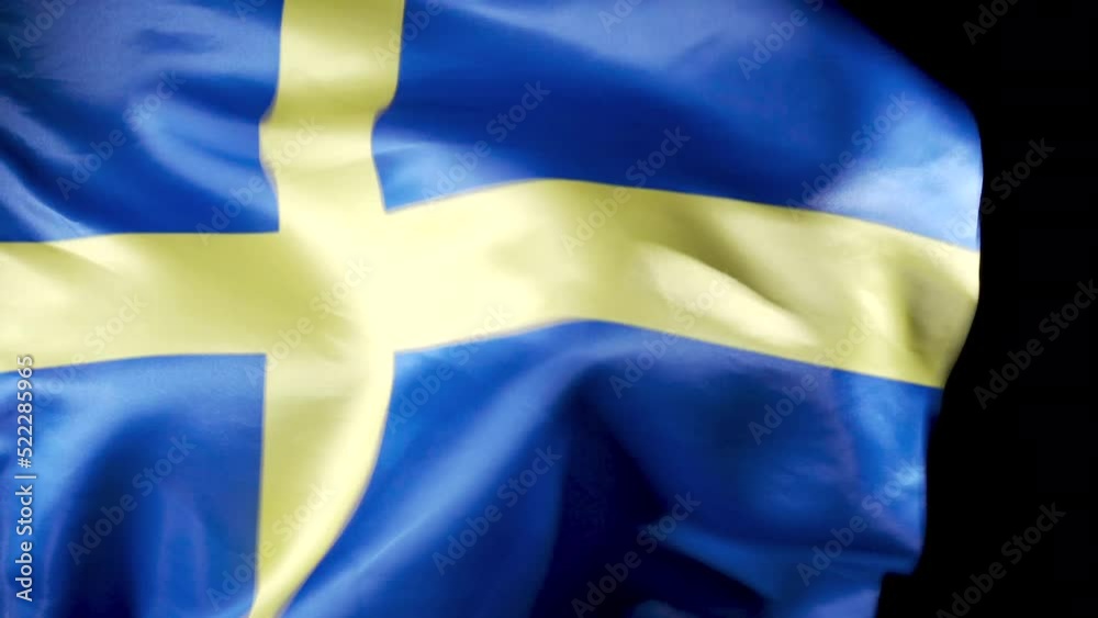 National Swedish Flag. Black background.
Swedish Flag is waving.
