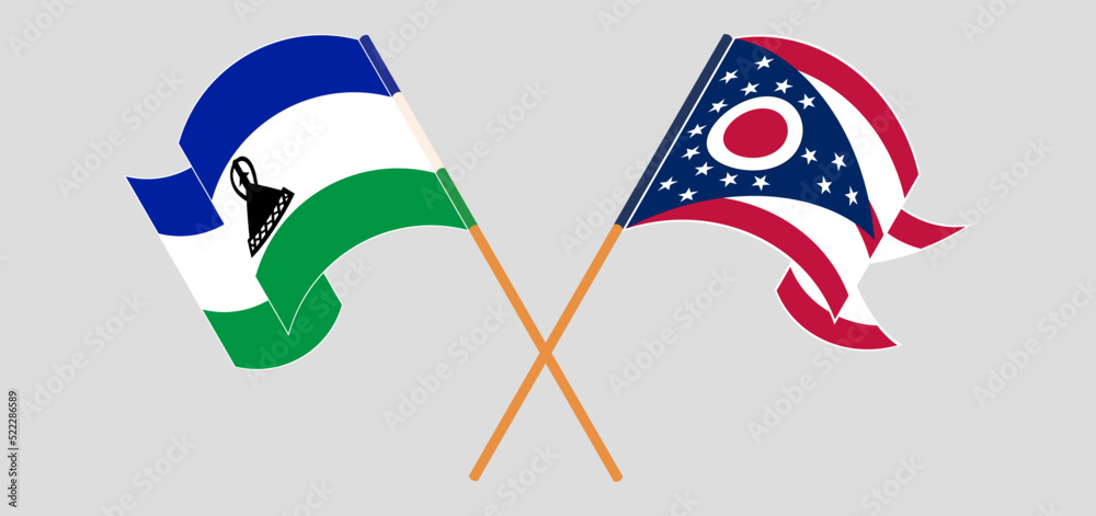 Crossed and waving flags of Lesotho and the State of Ohio