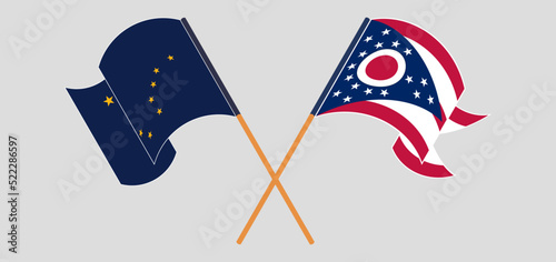 Crossed and waving flags of the State of Alaska and the State of Ohio