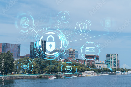 Panorama Boston city view skyline and Massachusetts Institute of Technology campus at day time. Glowing Padlock hologram. The concept of cyber security to protect companies confidential information