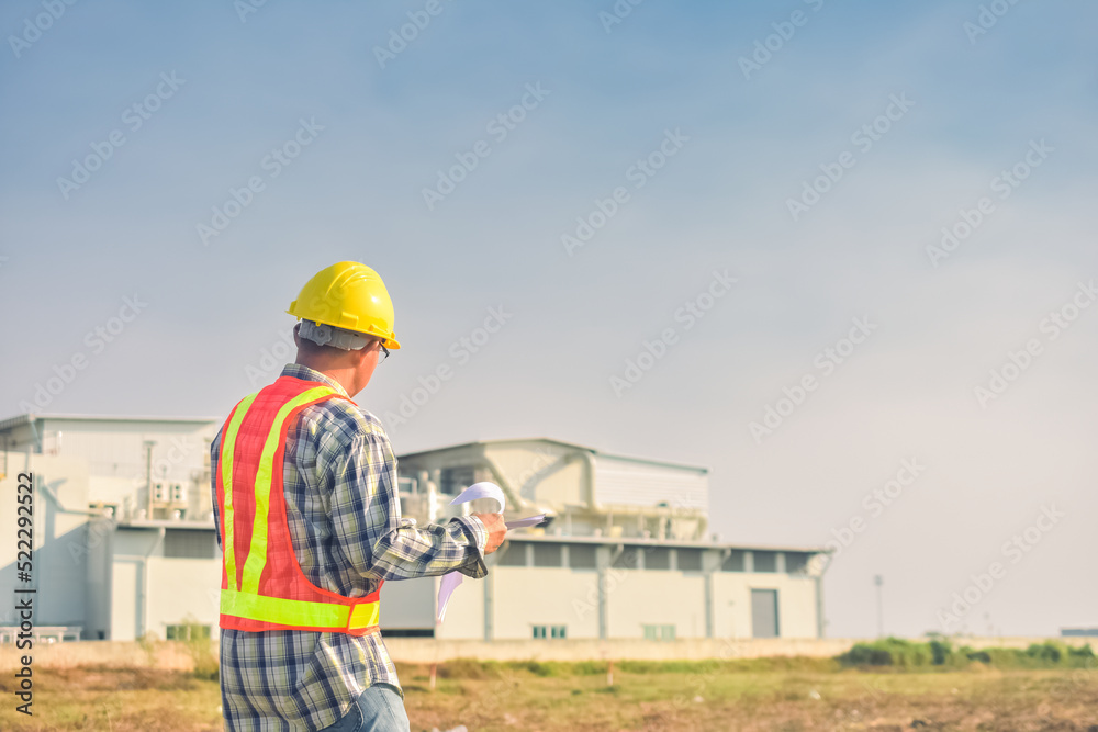 Senior Engineer Asian man working with tablet technology construction, construction worker with tablet computer and wearing construction uniform Senior Engineer Asian man working with tablet technology construction, construction worker with tablet computer and wearing construction uniform