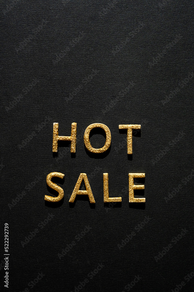 Hot sale - golden words on black. Online sale or clearance store concept. Hot sale - golden words on black. Online sale or clearance store concept.
