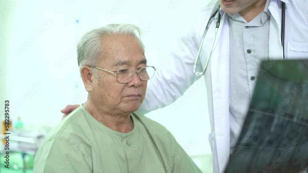 Asian old man taking or consulting with a professional physical therapist. Asian old man taking or consulting with a professional physical therapist.