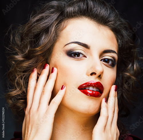 beauty rich woman with bright makeup wearing luxury jewellery on black background  fashion lady