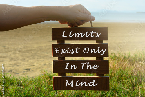 Motivational and inspirational quote on wooden frame.