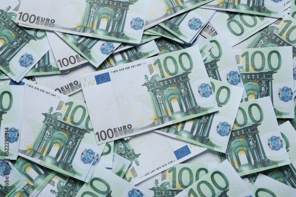 100 Euro banknotes as background, top view. Money exchange 100 Euro banknotes as background, top view. Money exchange