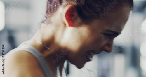 Fit, active and intense boxing workout of a woman at the gym. Closeup of female boxer in hardcore power training preparing for a fight through pain, sweat and exercise for a healthy strong lifestyle.