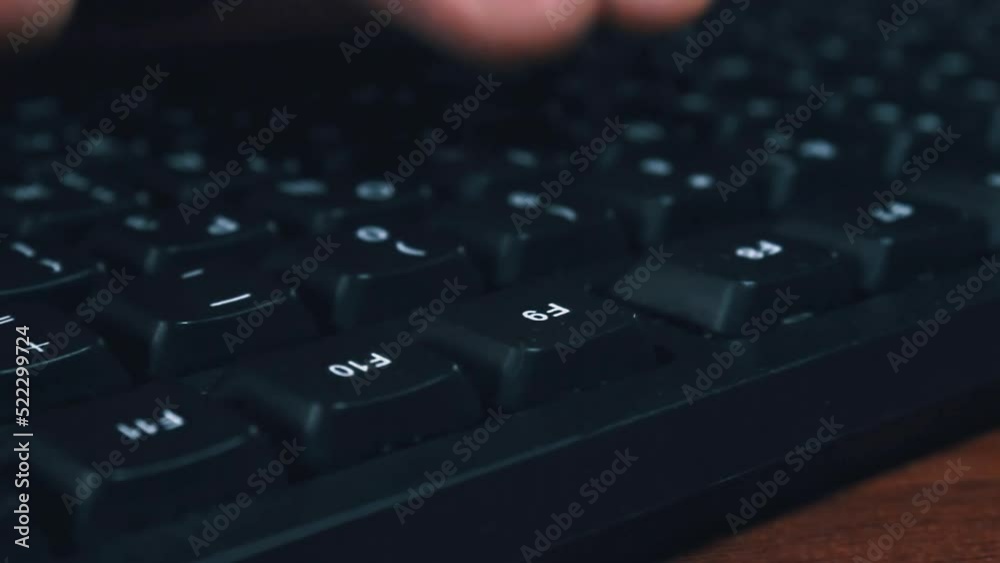 Man texting keyboard lying on desk, work using pc. Fingers typing close up, studying programming Man texting keyboard lying on desk, work using pc. Fingers typing close up, studying programming