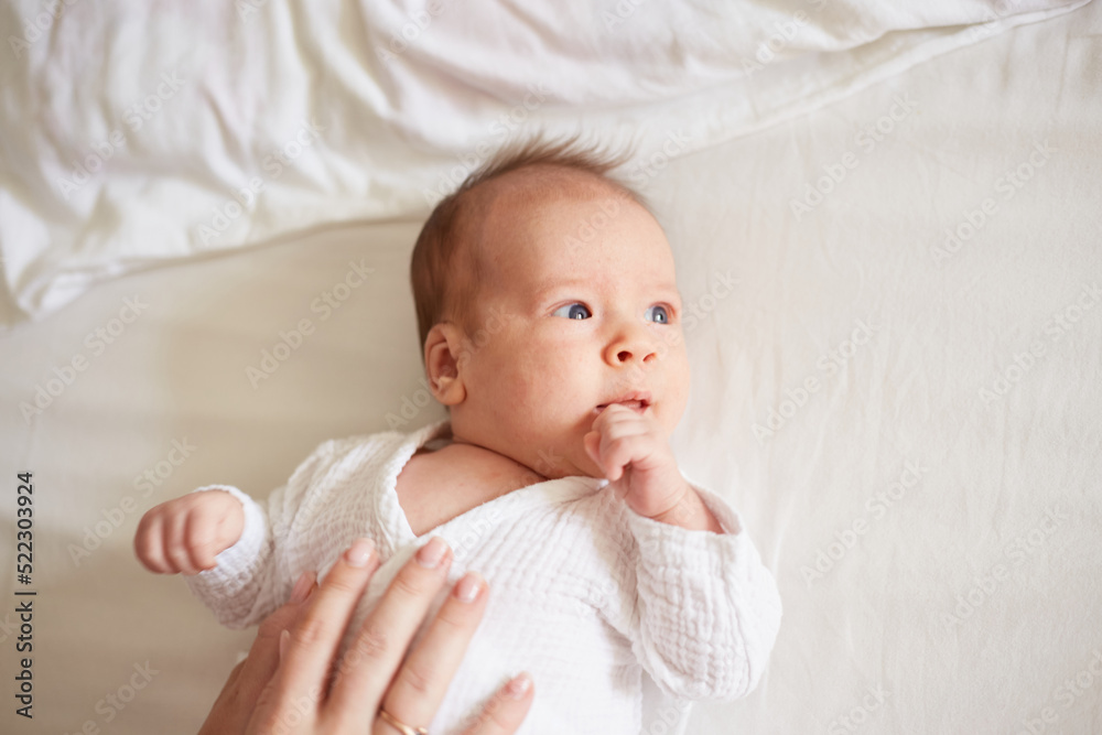 newborn one month old baby boy. smiling baby newborn one month old baby boy. smiling baby