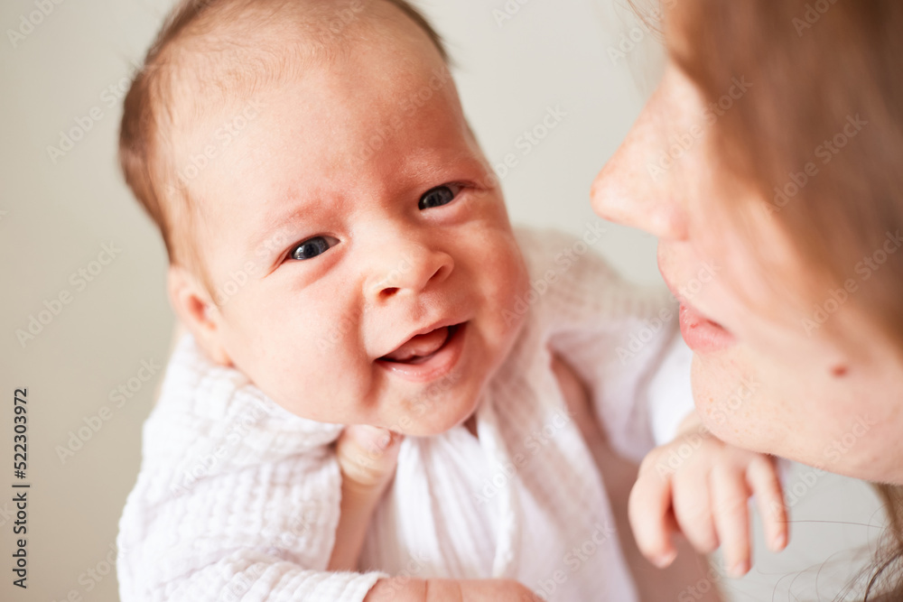 newborn one month old baby boy. smiling baby newborn one month old baby boy. smiling baby