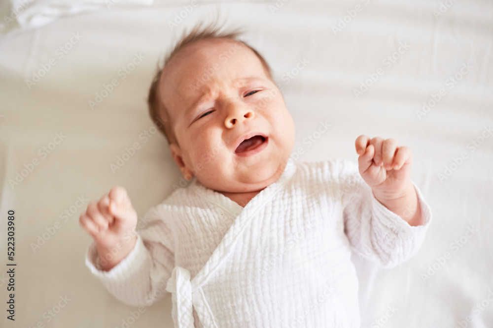 Crying Newborn one month old baby boy. Crying baby Crying Newborn one month old baby boy. Crying baby