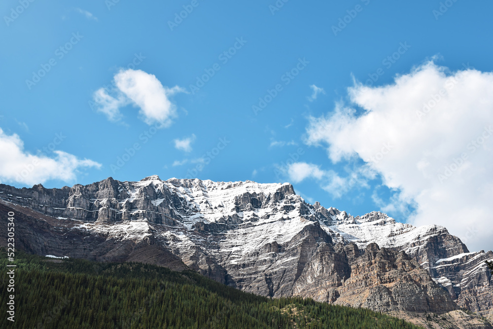 Mountains covered in snow and blue sky