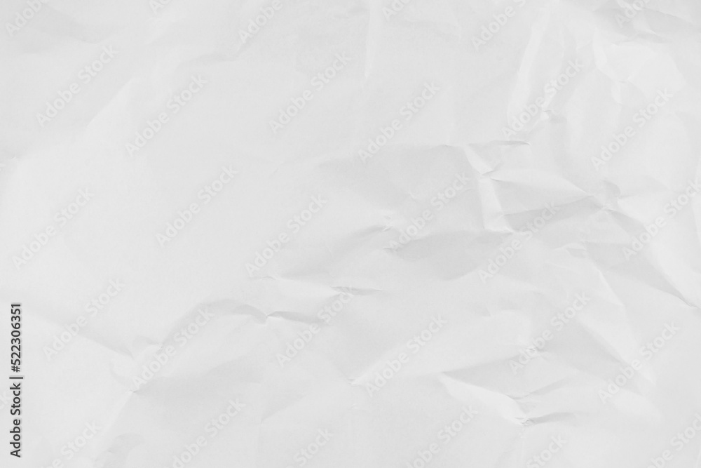 Obraz premium White crumpled paper texture background, clean white wrinkled paper, top view.