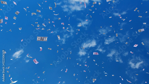 Fototapeta Naklejka Na Ścianę i Meble -  Money falling down from the sky 3D illustration.