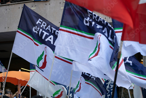GENOA, ITALY, JUNE 10, 2022 - Fratelli d'Italia's party flags during a political rally in Genoa, Italy.