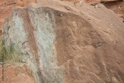 textured background of red stone in nature