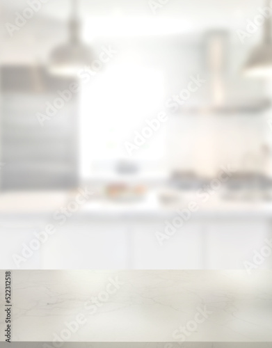 Empty marble desk on blurred kitchen window for product presentation. Stylish marble table top with copy space for your design at blurry kitchen.