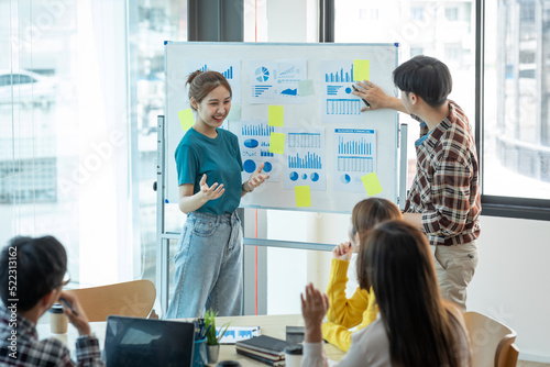 Diverse colleagues collaborative brainstorming at office briefing, Young Business Asian people explaining analysis at the meeting Multiethnic startup work.