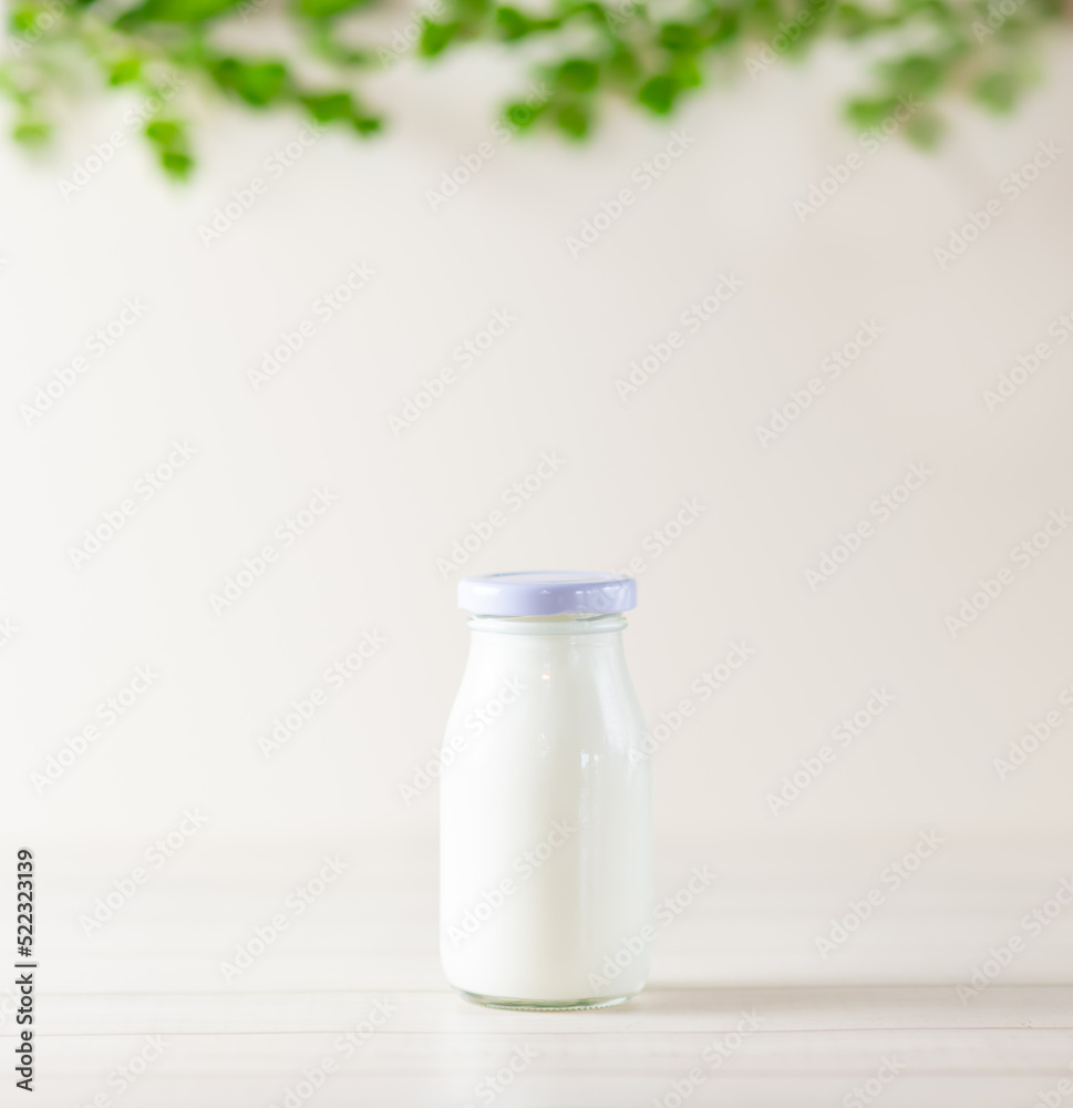 Cow's milk in a glass bottle Cow's milk in a glass bottle