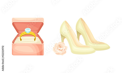Wedding symbols set. Golden ring in box and high heel shoes, attributes of bride cartoon vector illustration