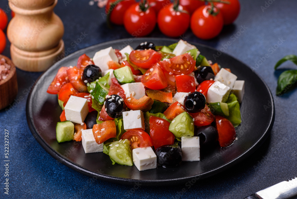 Greek salad with fresh vegetables, feta cheese and black olives Greek salad with fresh vegetables, feta cheese and black olives