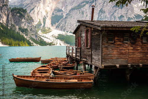 Fotografering Boathouse on the lake Braies
