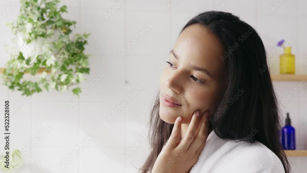 Beautiful face of young hispanic woman on white background. Wellness, self-love, natiral cosmetics concept Beautiful face of young hispanic woman on white background. Wellness, self-love, natiral cosmetics concept