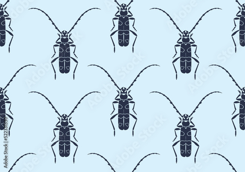 Alpine barbel beetles. Seamless pattern with insects isolated on a blue background. For printing on fabric, wallpaper, wrapping paper.