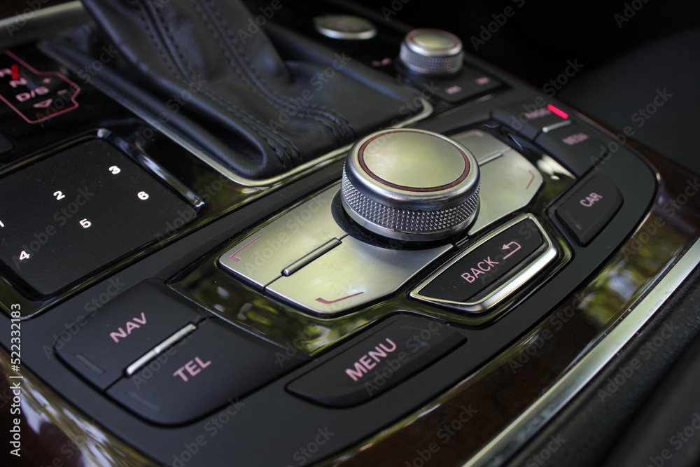 The control panel of the multimedia system of a modern car. The control panel of the multimedia system of a modern car.